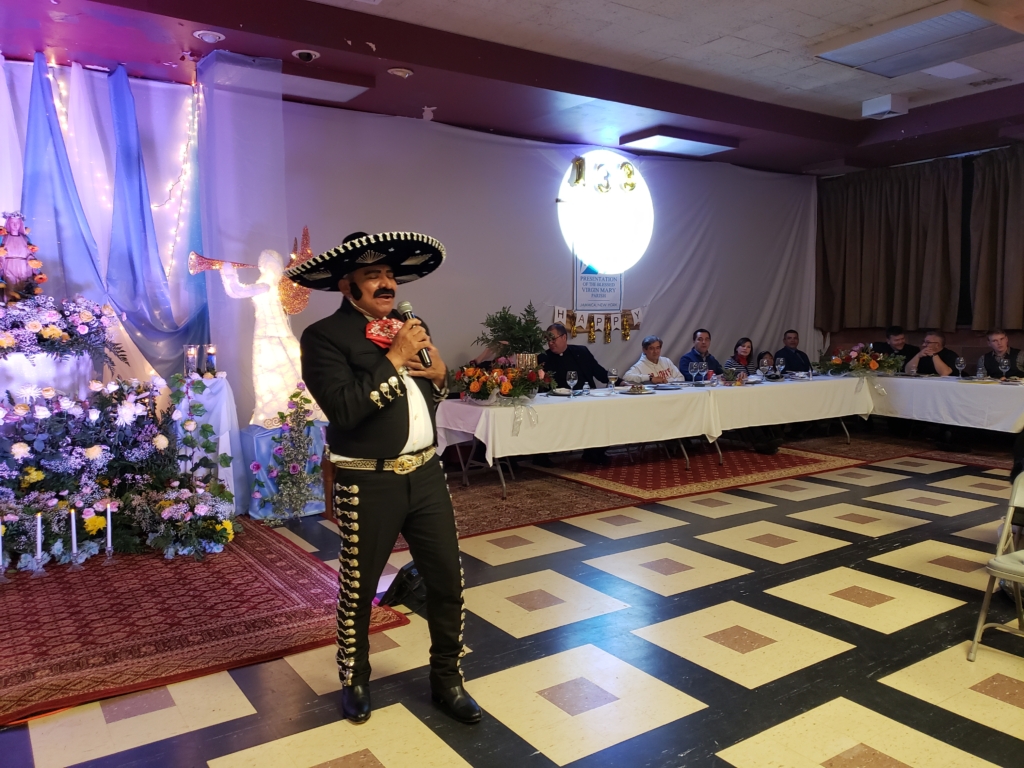 A man in a mexican costume is dancing