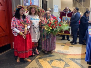 A group of women in traditional mexican dress.